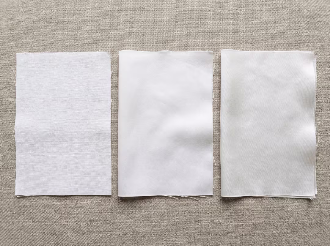 Percale, sateen, and bamboo swatches Percale, sateen, and bamboo swatches